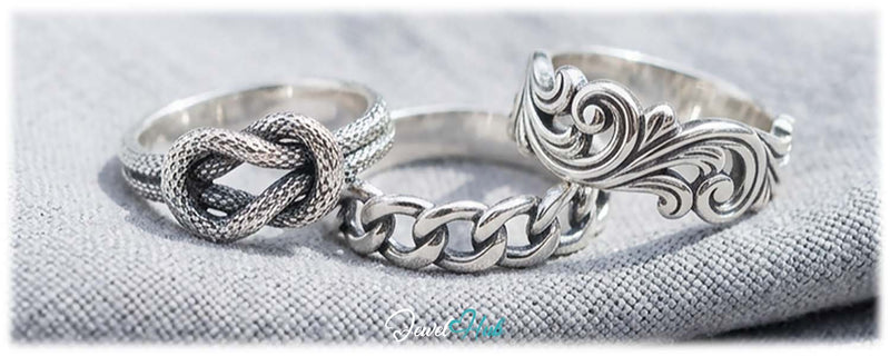 925 silver rings in textured knot, chain link and floral swirl styles