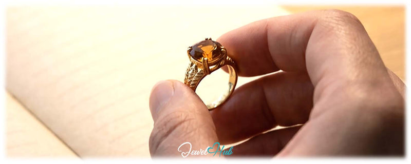 Gold fidget jewellery worn on the hand to help focus, from JewelHub