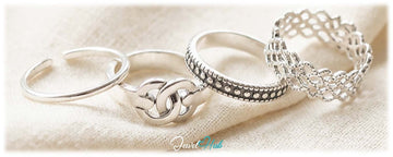 925 silver rings in open band, interlocking, dotted and lace styles