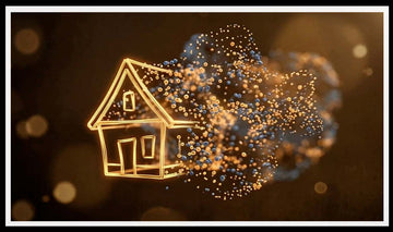Glowing gold outline of a house dissolving into sparkles