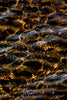 water droplets on brown sand