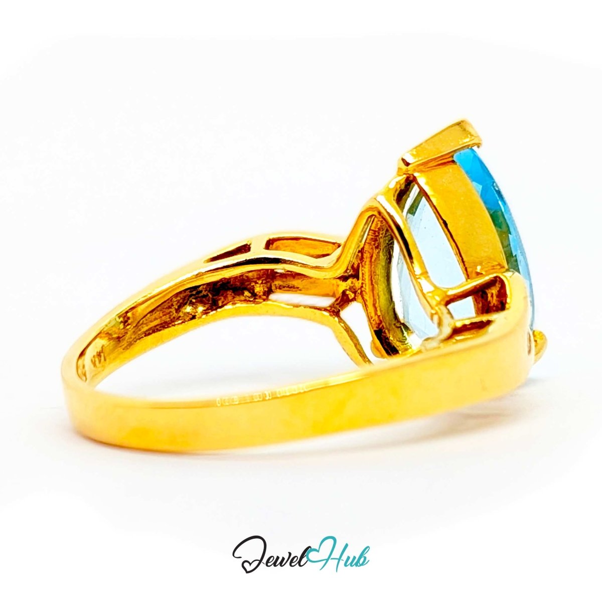 A 14k yellow gold ring featuring a rectangular light blue gemstone in a prong setting, shown on a white background with a 'JewelHub' watermark at the bottom.