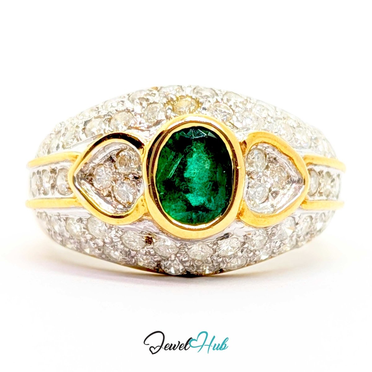 A 14k yellow gold ring featuring a central oval green emerald-cut gemstone, flanked by teardrop-shaped diamond clusters, with a pavé diamond band, shown on a white background with a 'JewelHub' watermark.