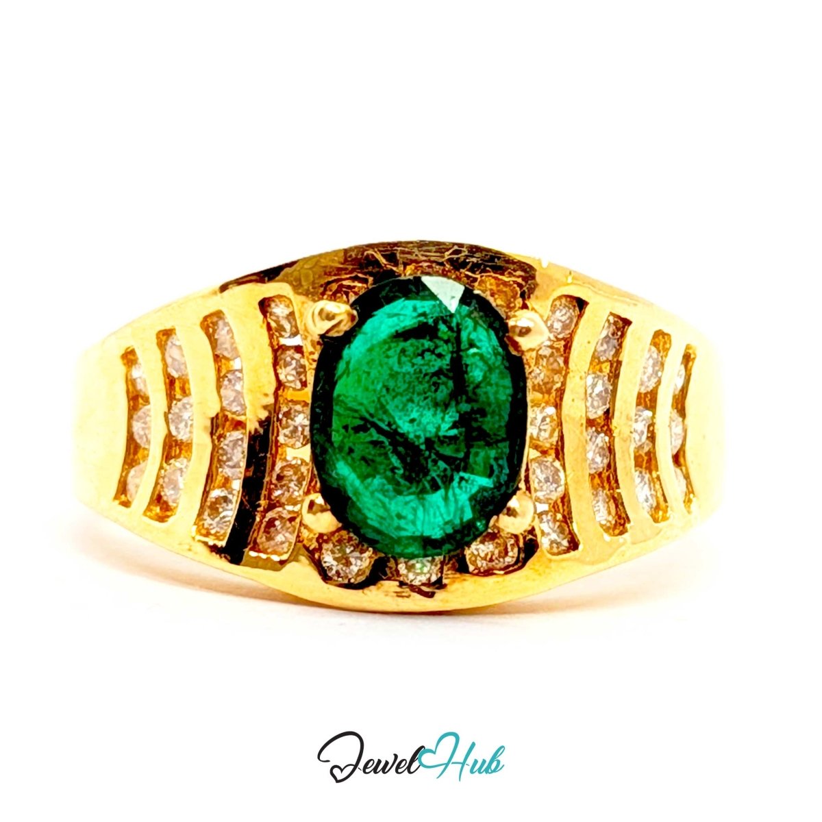 A yellow 14k gold ring featuring a large oval-cut green emerald gemstone in the center, surrounded by small clear accent stones set in a split shank design, shown on a white background with a 'JewelHub' watermark.