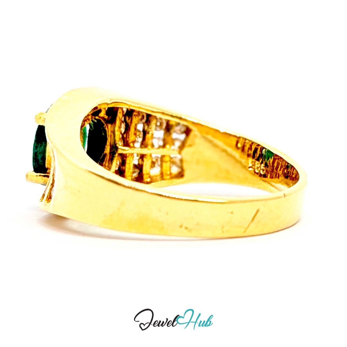 A yellow 14k gold ring with a row of small clear stones and two dark green oval gemstones on the sides, shown on a white background with a 'JewelHub' watermark at the bottom.