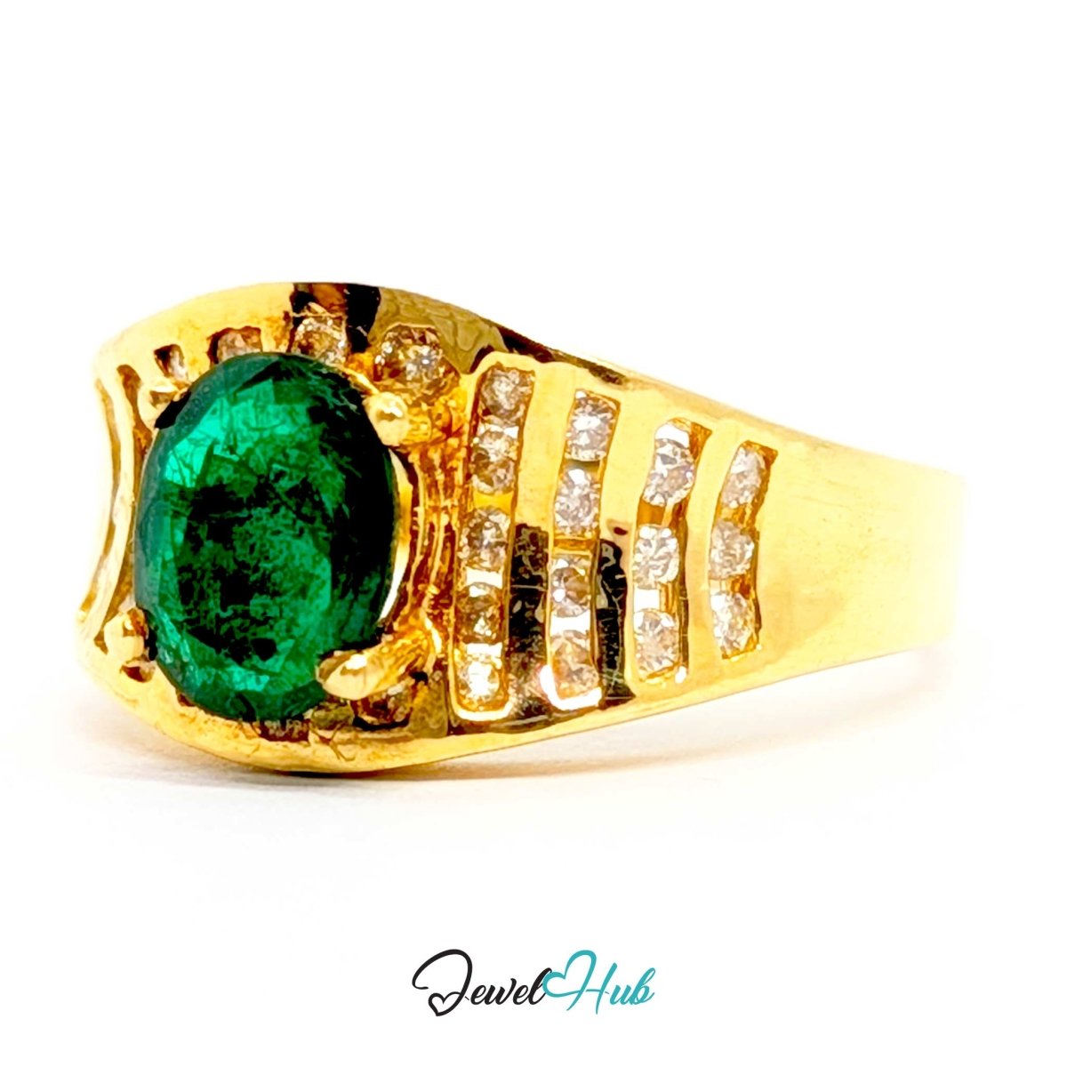 A 14k yellow gold ring featuring a large oval-cut green emerald gemstone and rows of small clear accent stones on the shoulders, shown on a white background with a JewelHub watermark.