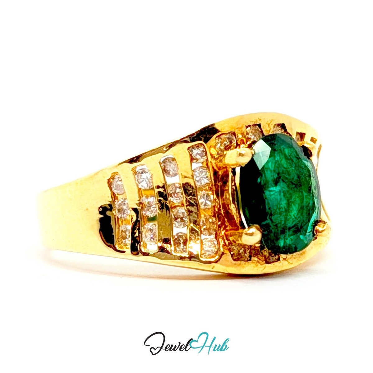 A yellow 14k gold ring featuring a large oval-cut green emerald gemstone and rows of small clear accent stones on the shoulders, shown against a plain white background with a 'JewelHub' watermark at the bottom.