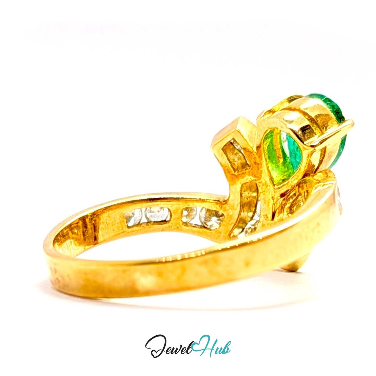 A 14k yellow gold ring featuring a split setting with a marquise-cut green opal and small clear accent stones on the band, shown on a white background with a JewelryHub watermark.