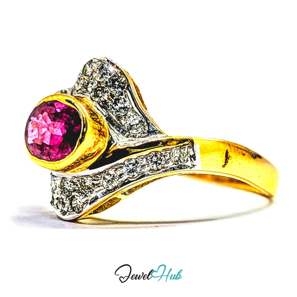 A solid 14k gold ring with a round pink gemstone and pavé-set clear stones, shown on a white background with a JewelHub watermark.