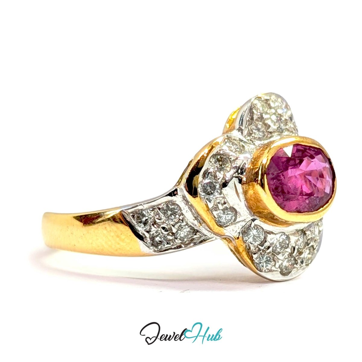 A yellow solid 14kgold ring with a central oval pink gemstone and pavé-set clear stones, shown on a white background with a 'JewelHub' watermark at the bottom.