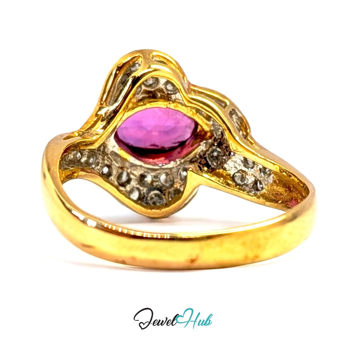 A vintage-style solid 14k ring featuring a central oval pink gemstone surrounded by small clear stones, set on a polished gold band, shown against a white background with a 'JewelHub' watermark at the bottom.