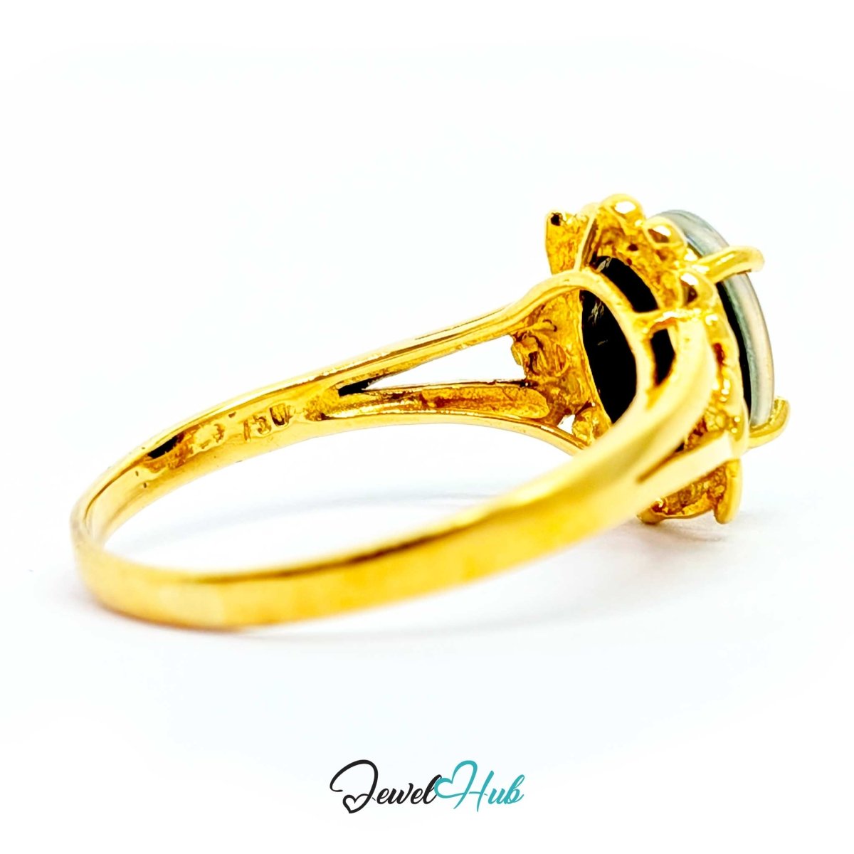 A 18k yellow gold ring with a large oval-cut dark stone, shown in a side profile view on a white background with a 'JewelHub' watermark at the bottom.