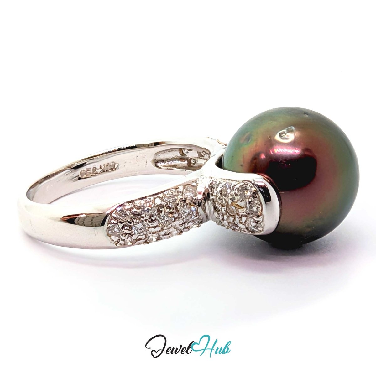 18k white gold ring featuring a large, round, dark green-black Tahitian pearl accented by pavé-set clear crystals on the band, shown on a white background with a 'JewelHub' watermark.