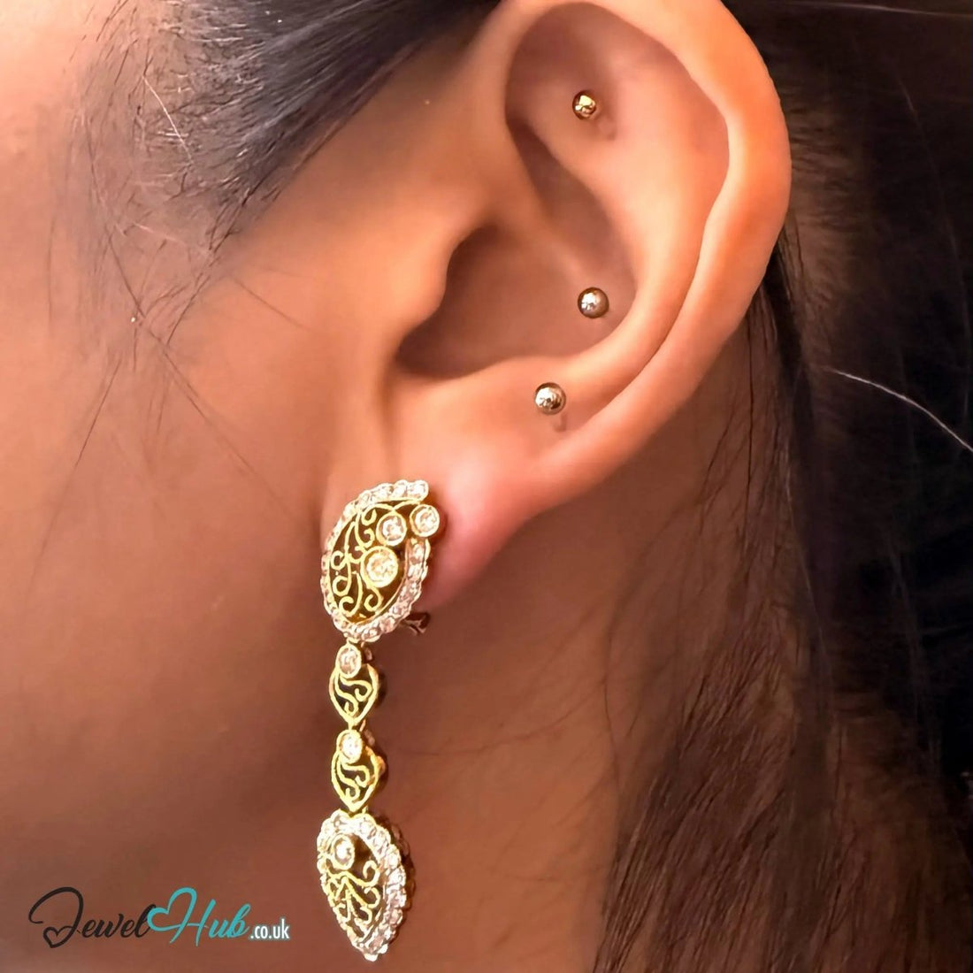 Celestia Bloom earrings in 18k gold, set with 82 natural pave diamonds across the pair