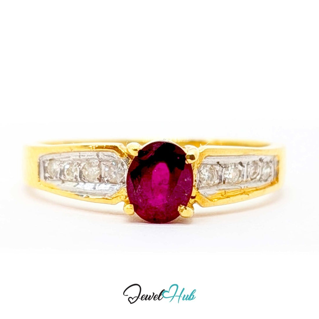 A yellow 14k gold ring featuring a prominent oval-cut deep pinkish-red center stone, flanked by rows of small clear stones on a white background.