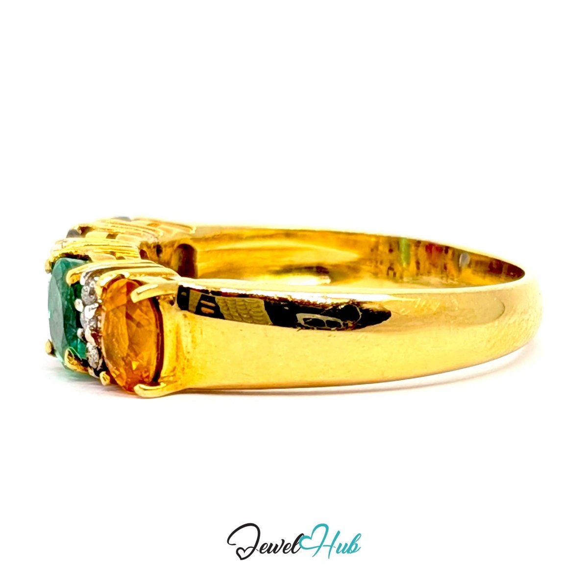 A 18k yellow gold ring featuring a rectangular green emerald-cut center stone, accented by small clear stones and a round amber-colored stone on the shoulders, shown on a white background with a 'JewelHub' watermark.