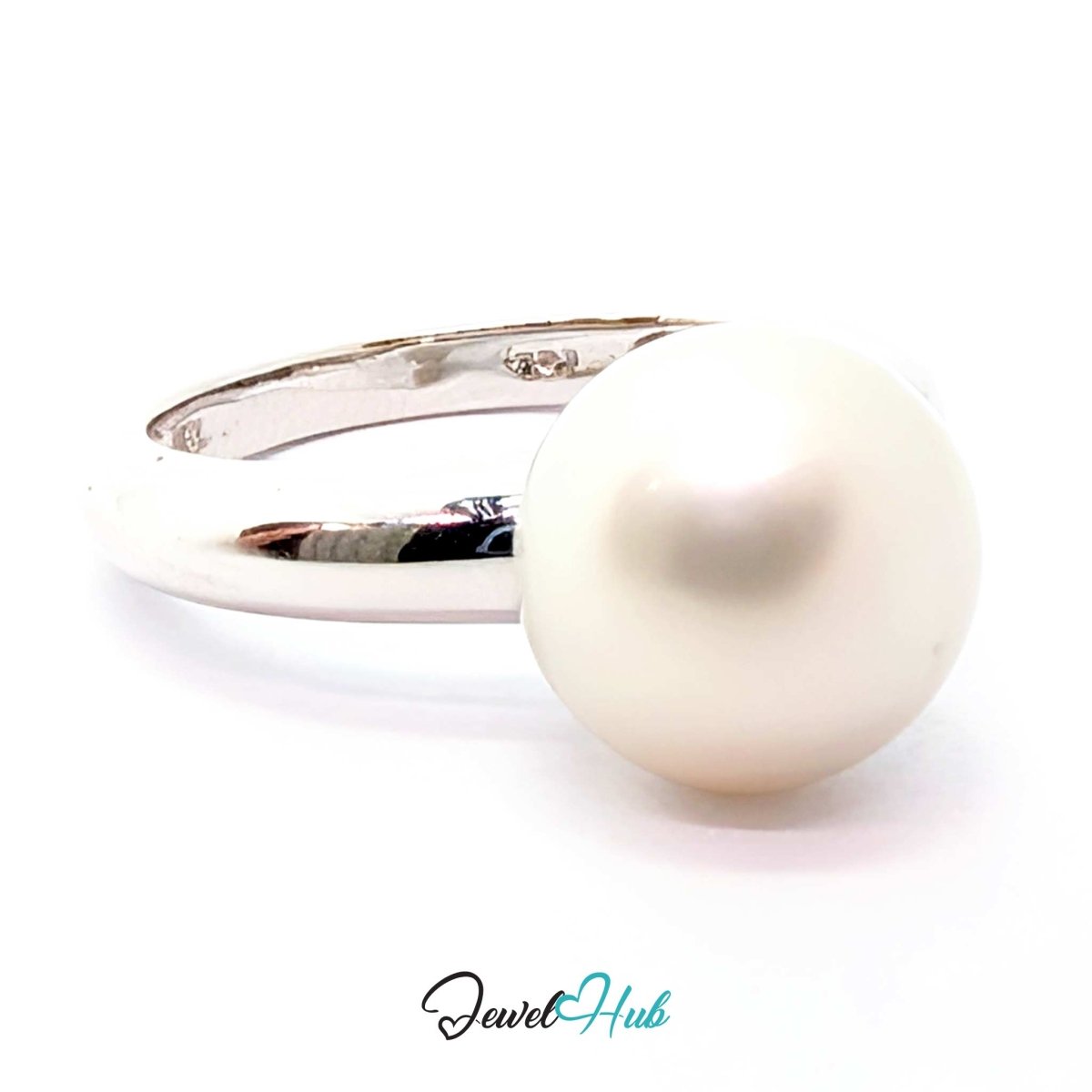 A classic 18k white gold pearl ring featuring a large, round, lustrous white pearl set on a polished silver band, shown against a plain white background with a 'JewelHub' watermark at the bottom.