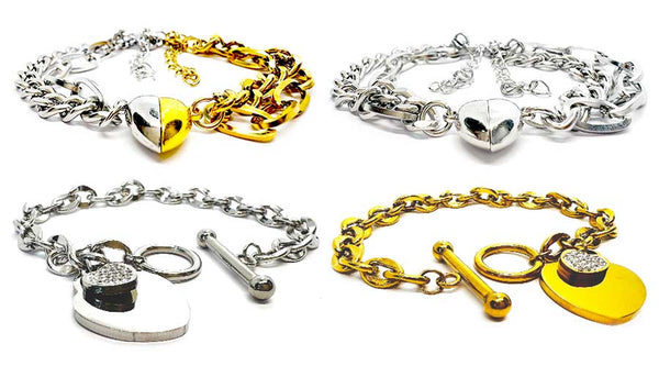 Two pairs of gold and silver chain bracelets with heart-shaped charms on a white background.