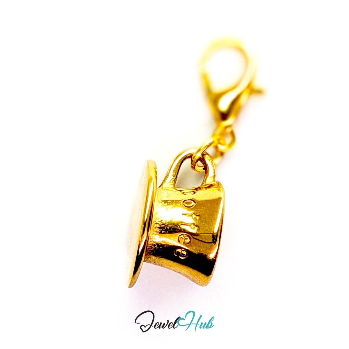 Three-dimensional coffee cup and saucer charm in gold stainless steel - shown with the lobster clasp attached - JewelHub