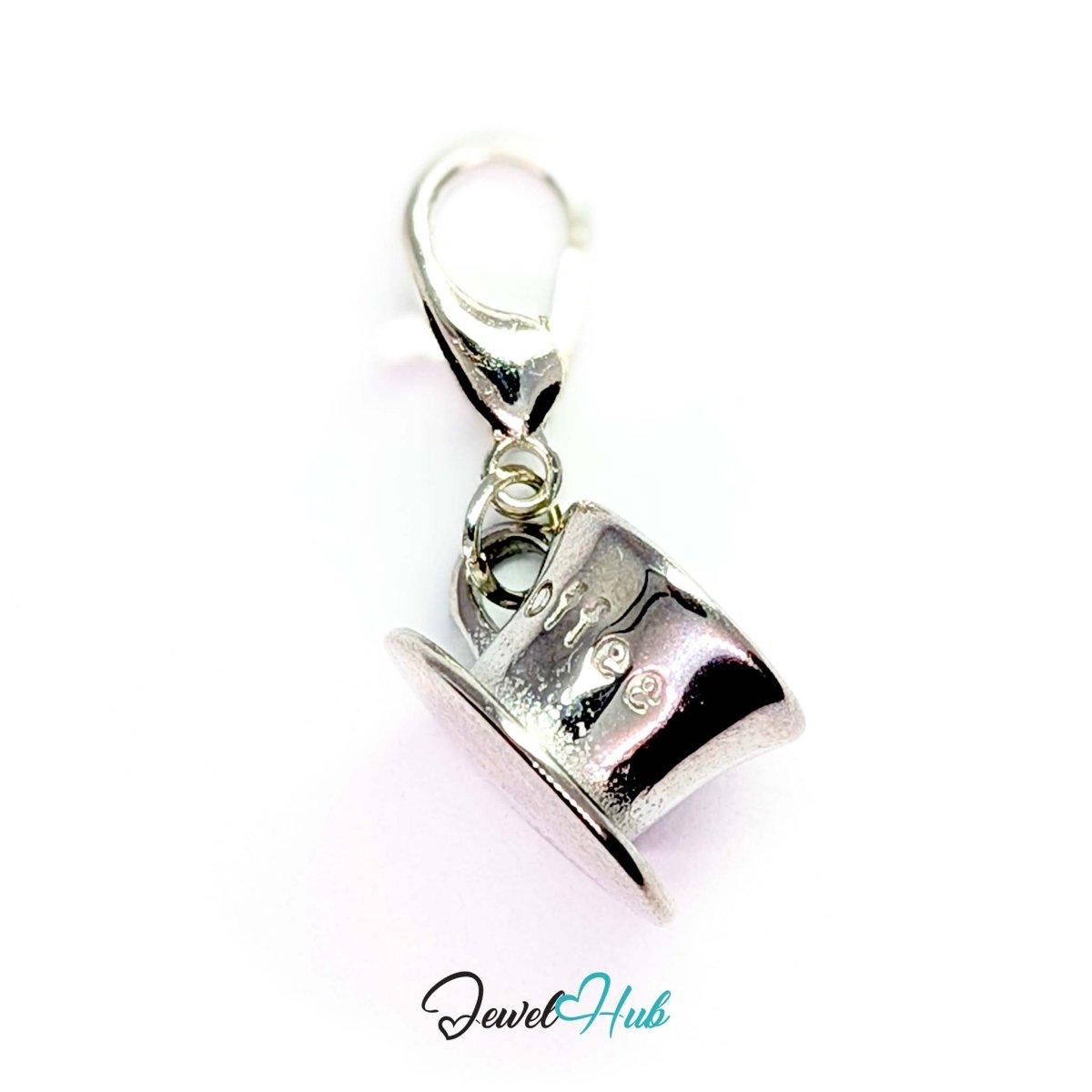 Three-dimensional coffee cup and saucer charm in silver stainless steel - shown with the lobster clasp attached - JewelHub