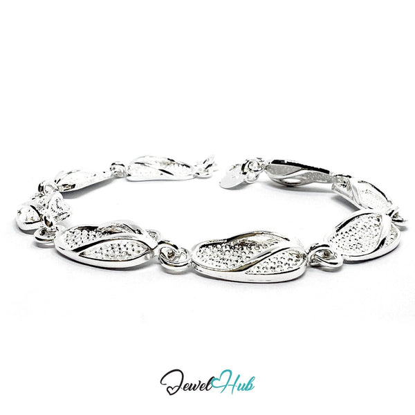 925 Sterling Silver LeafLink Bracelet – Sculptural Chain with Textured Slipper Charms - JewelHub.co.uk