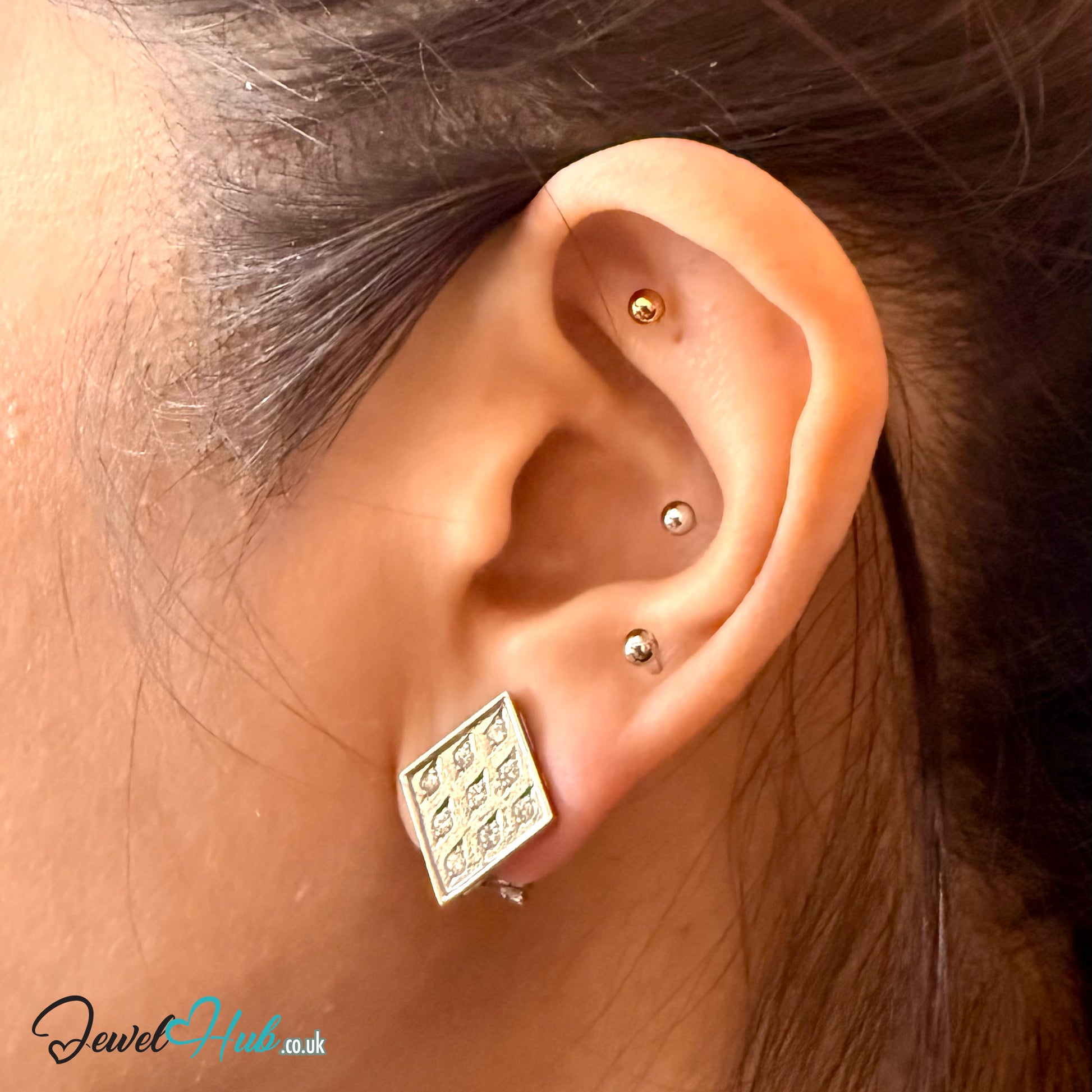 14k white gold diamond earrings with a nine-stone checker grid on each square plaque