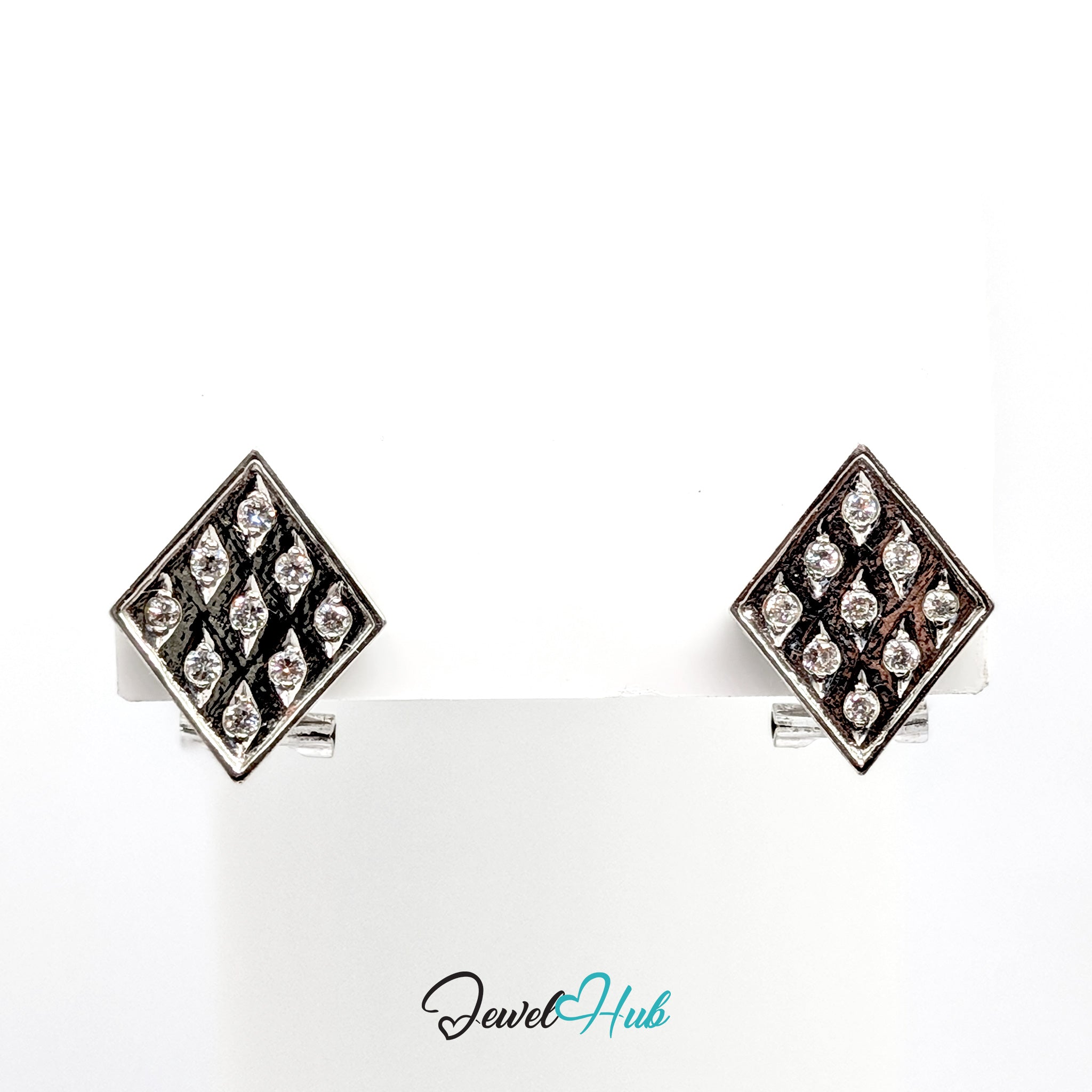 14k white gold diamond checker earrings on a white presentation card