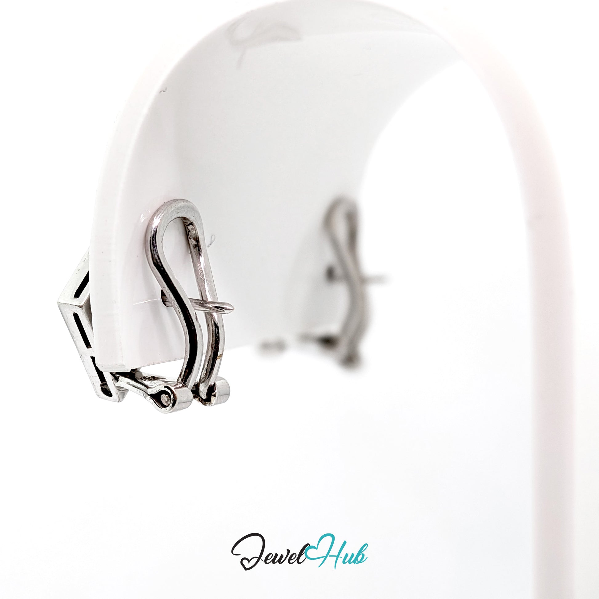 14k white gold checker diamond earrings, 18 round diamonds totalling 0.54 carats across the pair