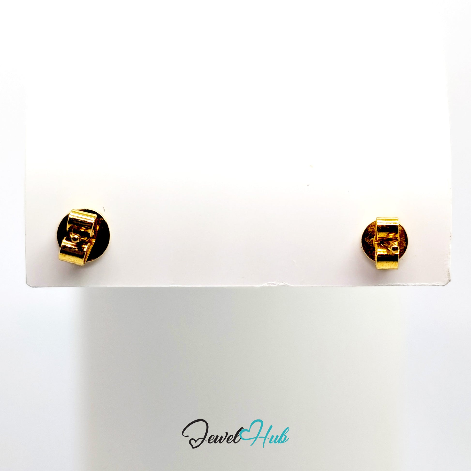 Luna Spark gold diamond studs with butterfly backs removed, showing the posts