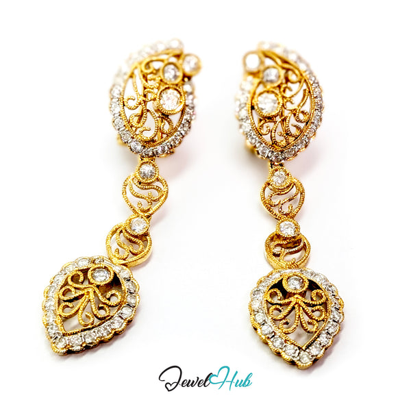Celestia Bloom earrings in 18k gold, set with 82 natural pave diamonds across the pair