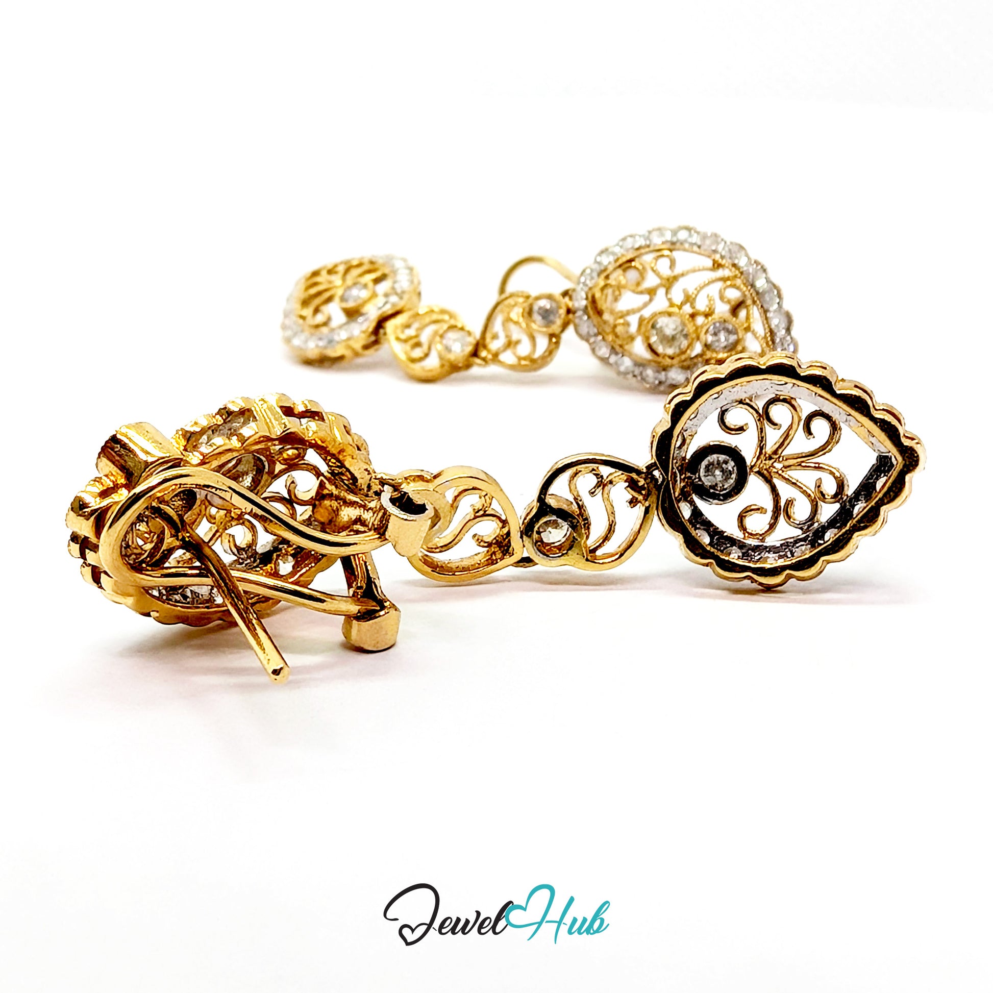 18k gold earrings set throughout with small natural round brilliant diamonds