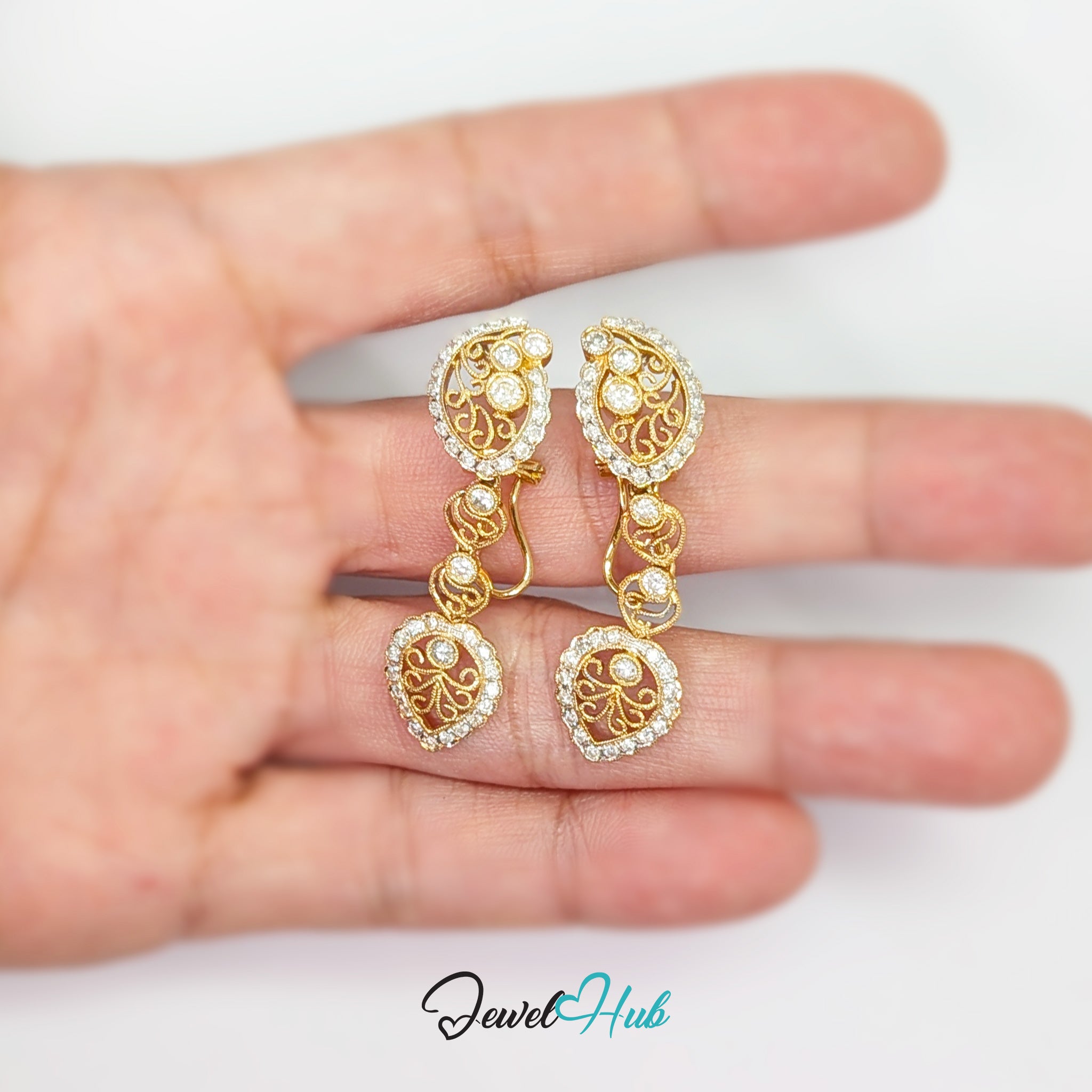 Celestia Bloom 18k gold diamond earrings from JewelHub