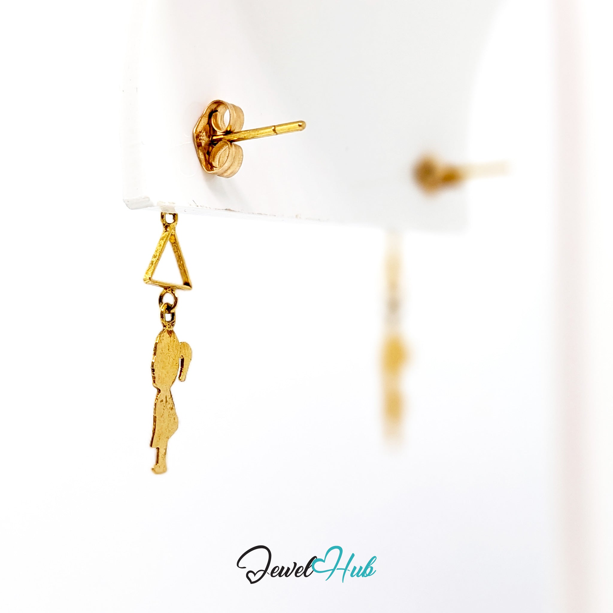 Close view of the flat girl-in-profile silhouette with a ponytail in solid 14k gold
