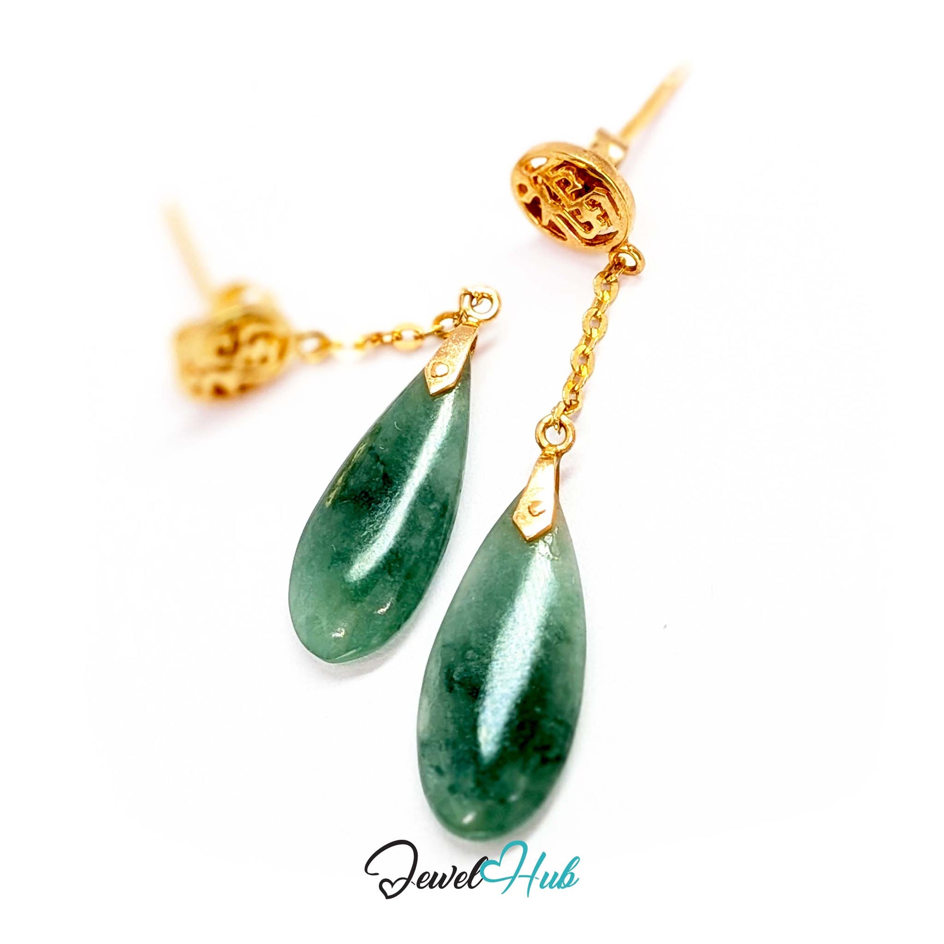 Translucent edges of the jade lifting as light passes through the turning drop - JewelHub