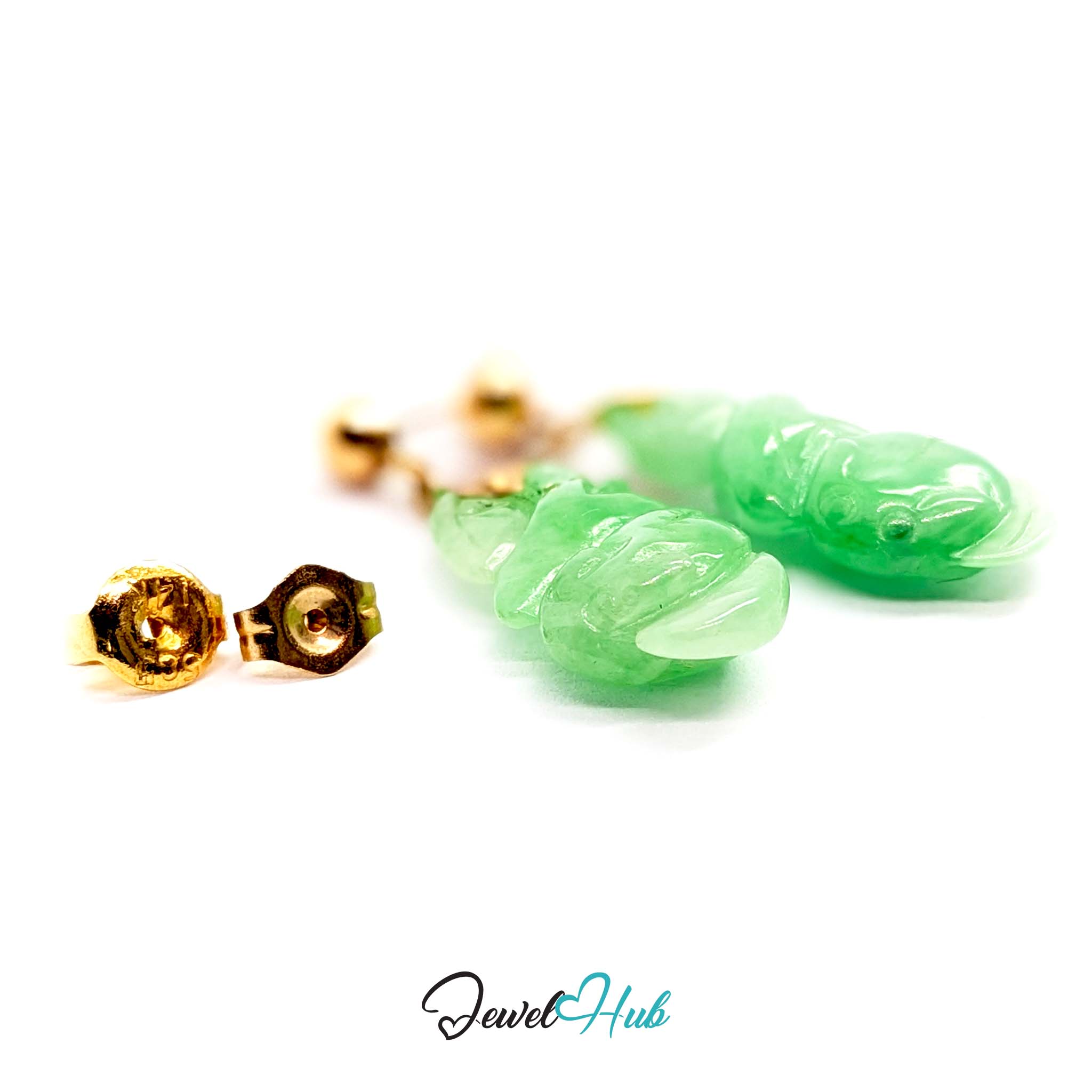 Translucent thinner edges of the carved jade glowing against the light - JewelHub