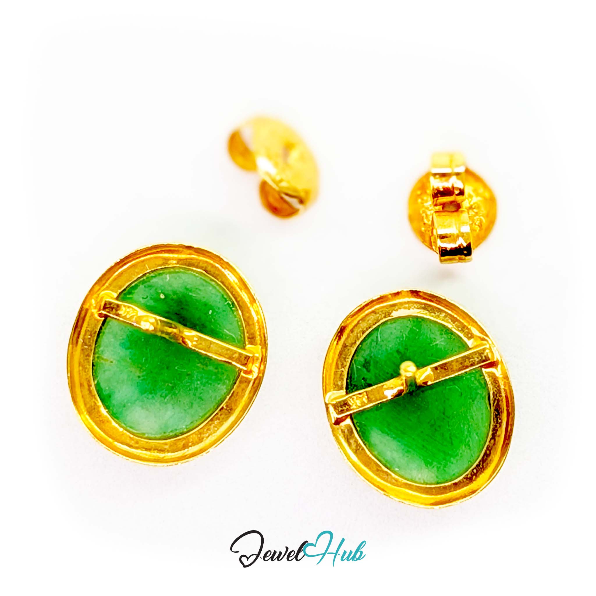 Domed jade cabochon catching light across its polished surface - JewelHub