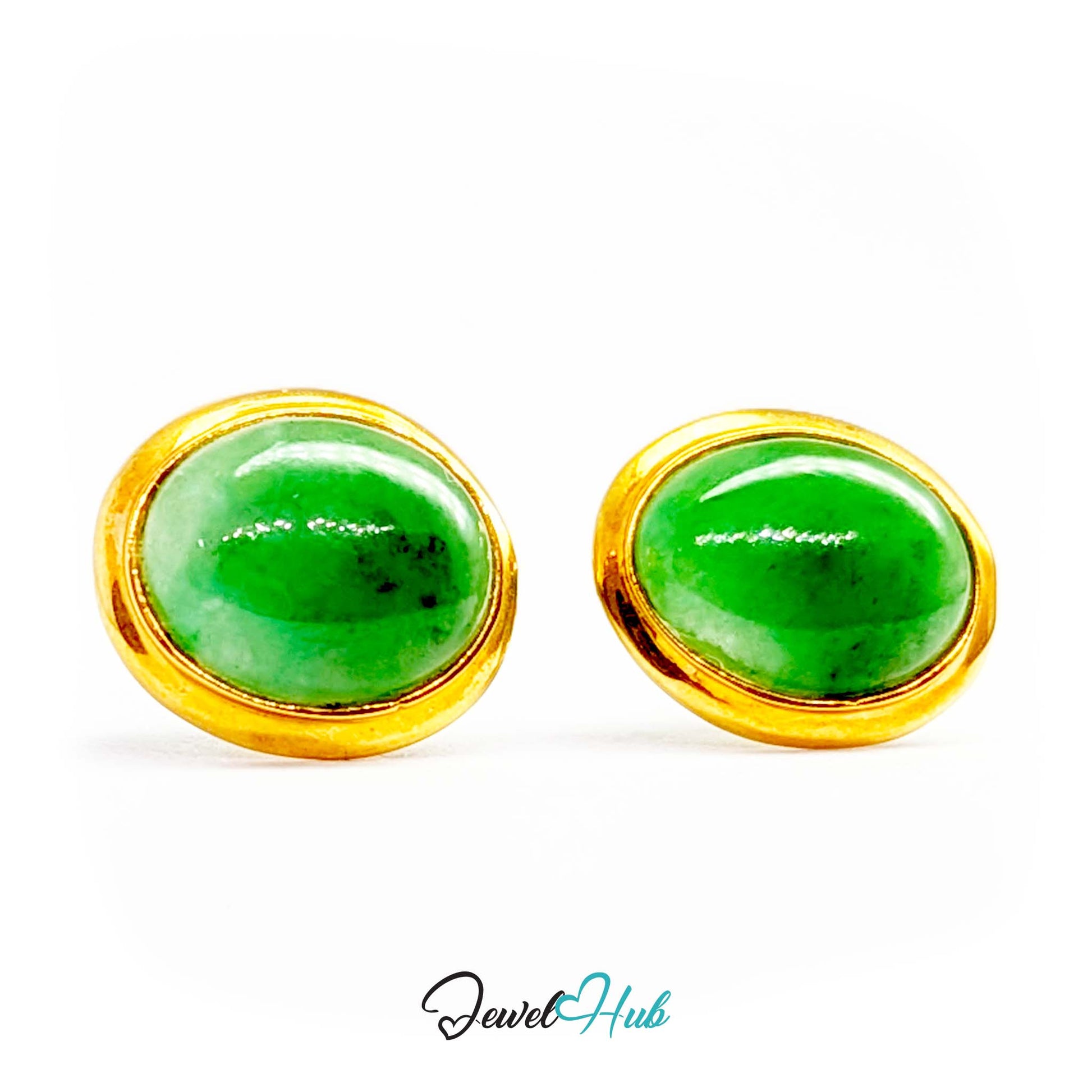 Warm gold bezel set directly against the green jade to deepen the colour - JewelHub