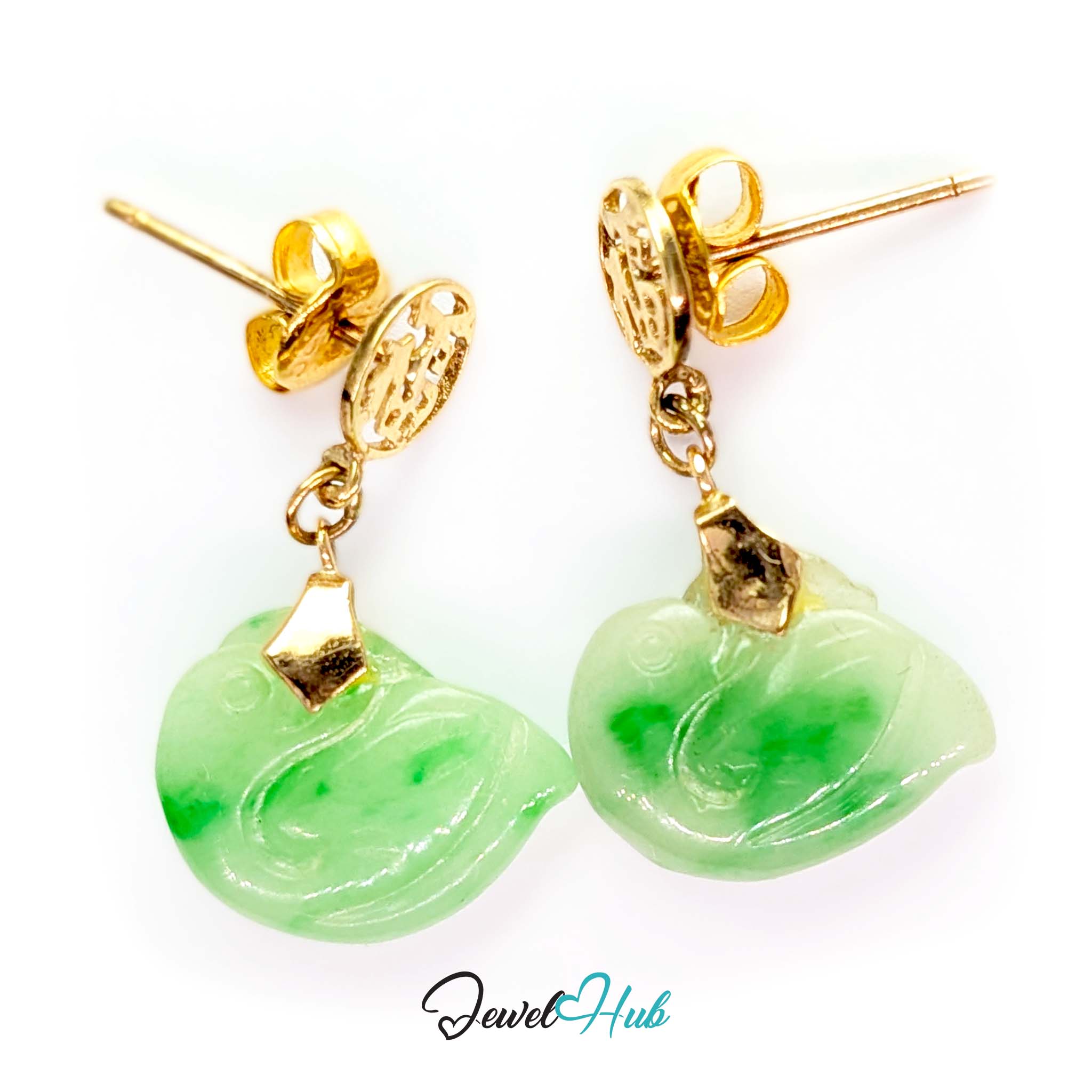 Swan carved in low relief in apple green jade, with a round eye and a curving wing - JewelHub