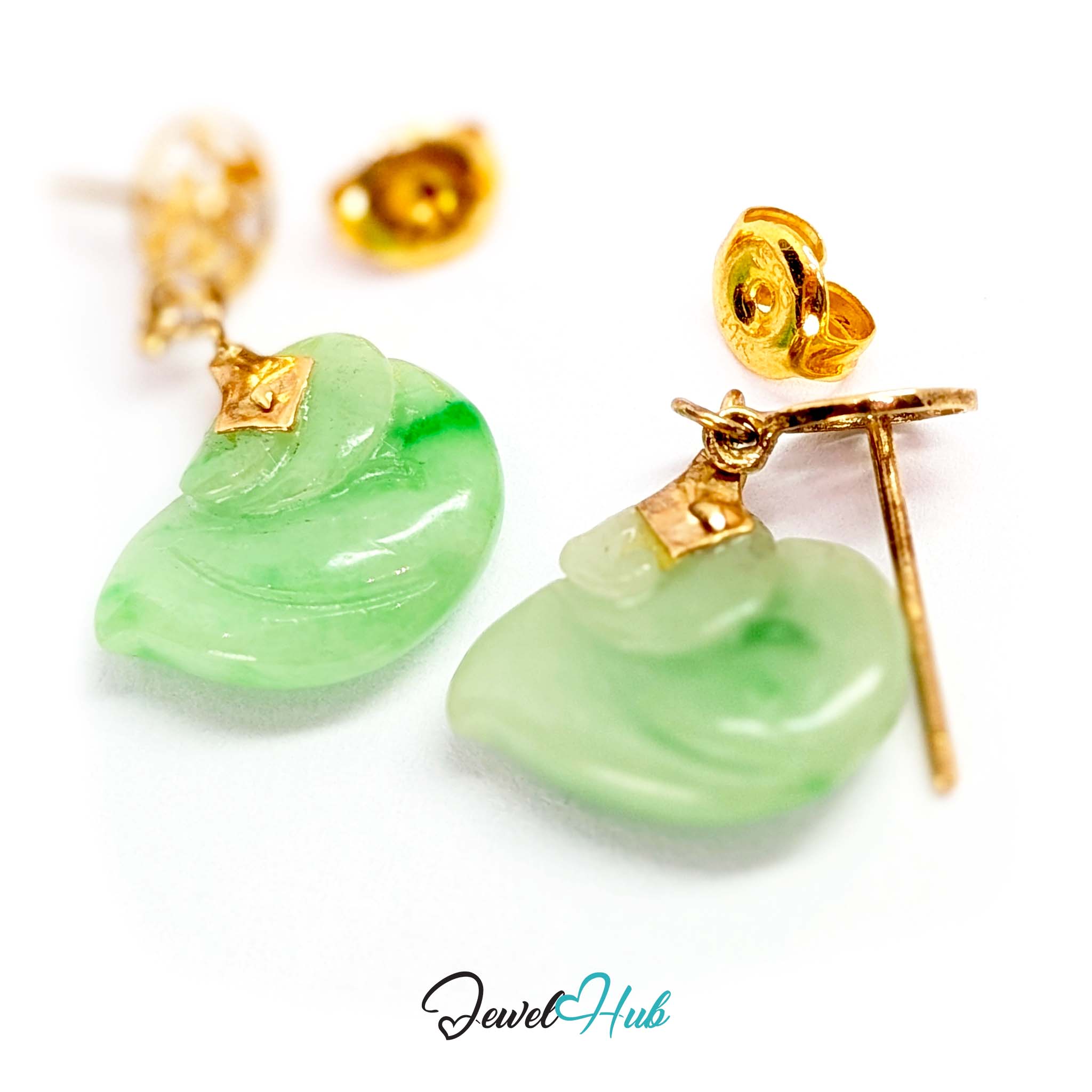 Long wing line sweeping across the body of the jade swan to a tapering tail - JewelHub
