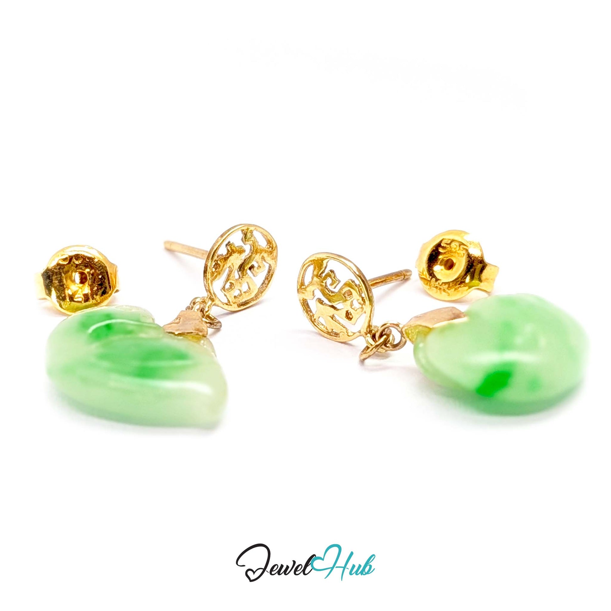 Apple green jade with deeper natural drifts running through the carved body - JewelHub