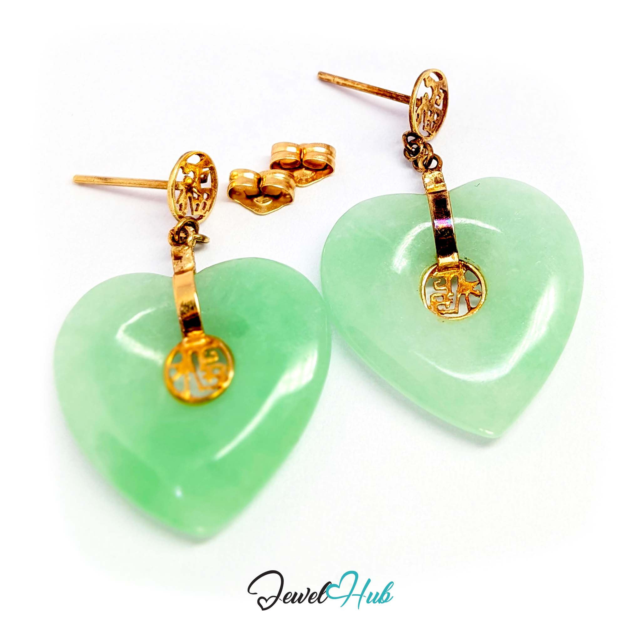 Jointed link letting the large jade heart swing clear of the lobe - JewelHub
