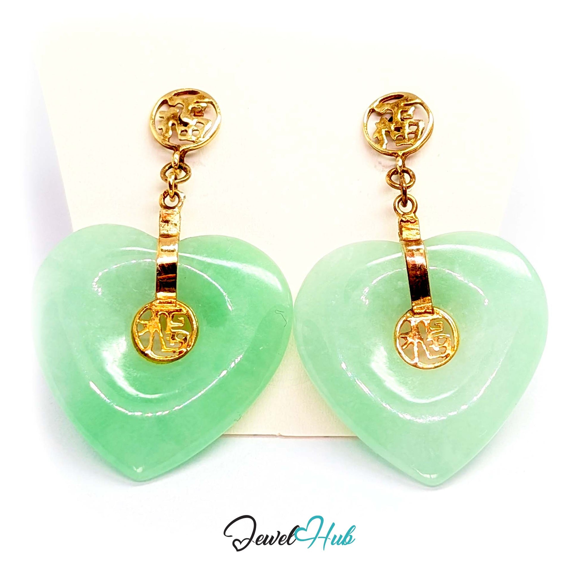 Light travelling into the body of the large jade heart, giving a soft glow - JewelHub
