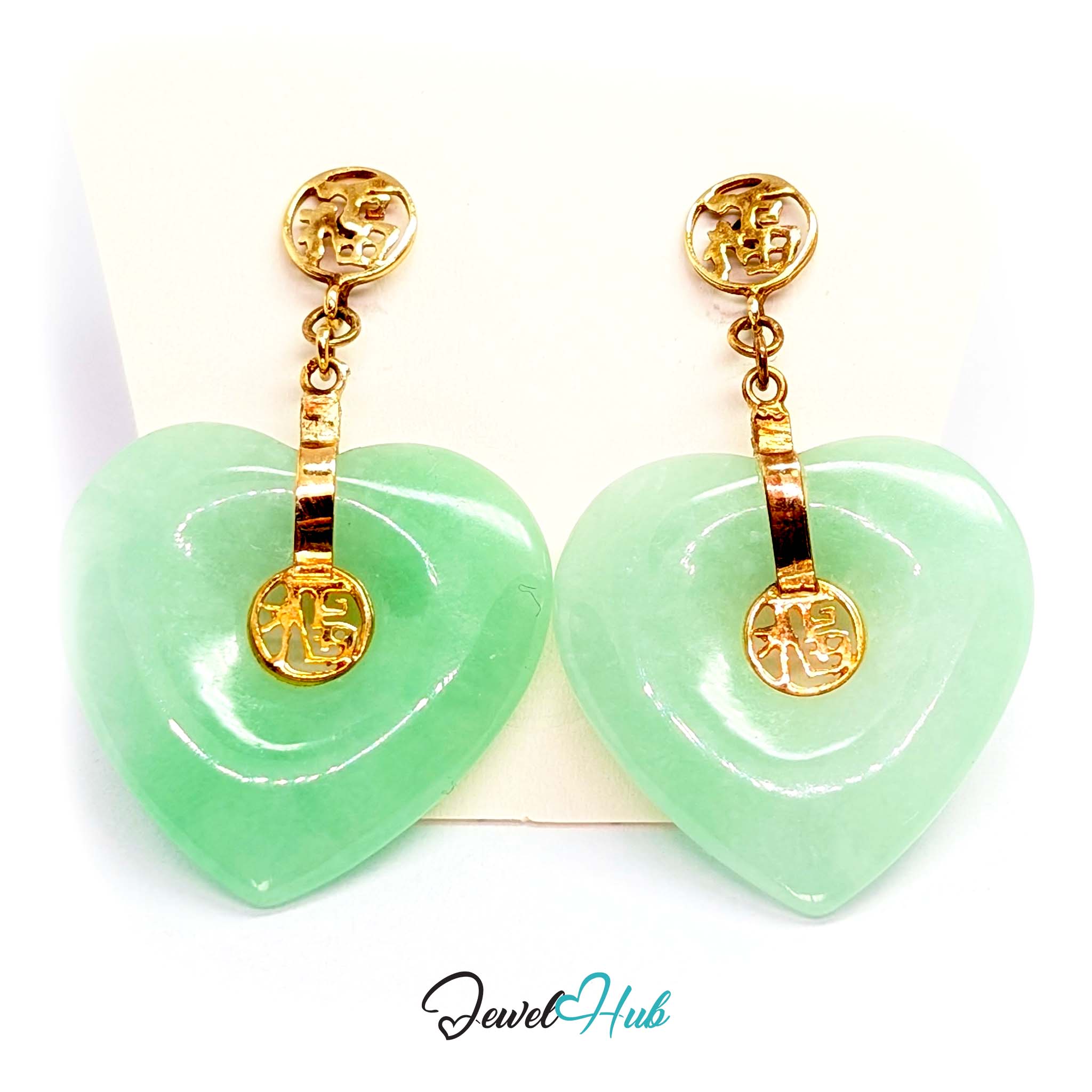Light travelling into the body of the large jade heart, giving a soft glow - JewelHub