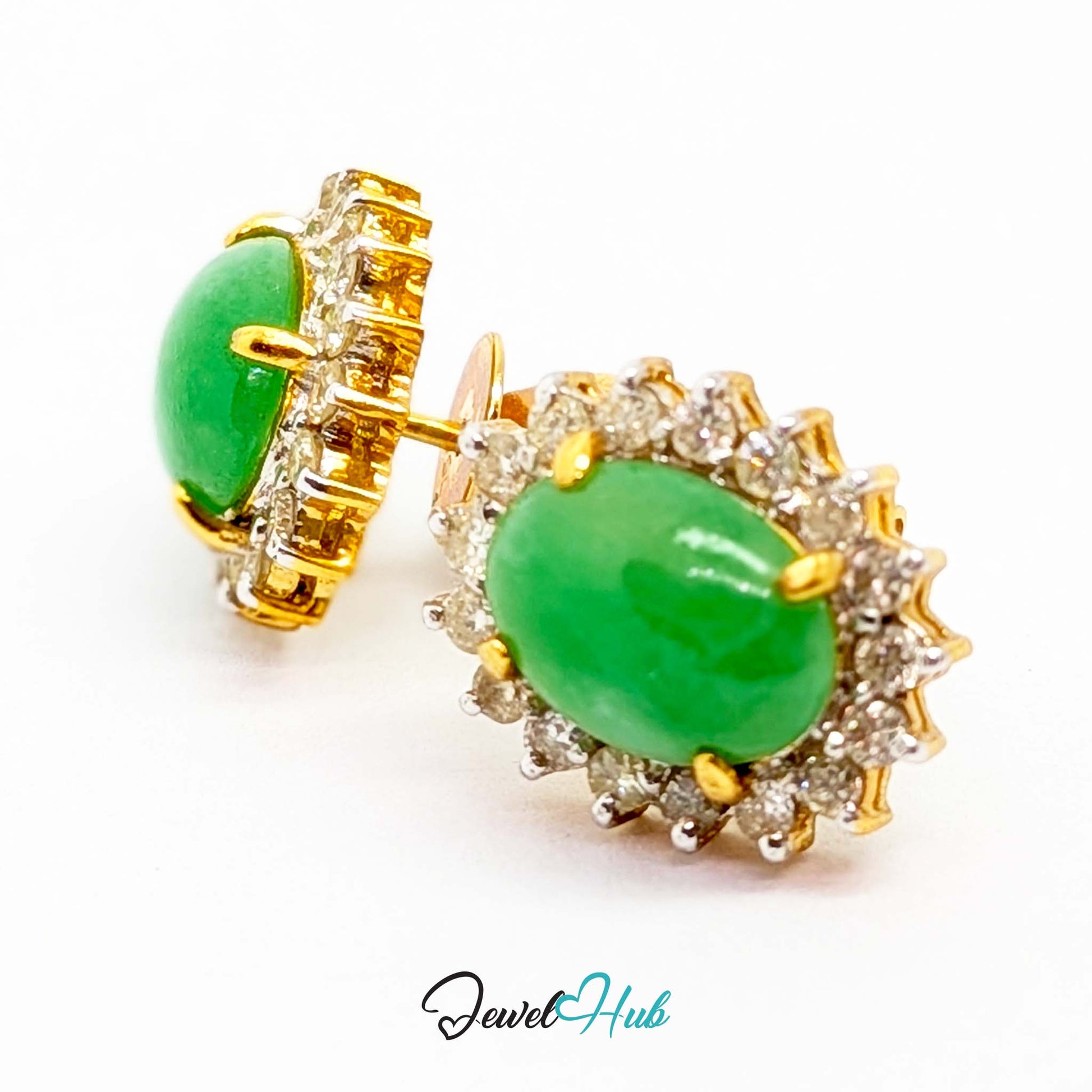 Oval jade cabochon, about 7 x 9.5mm, held in four yellow gold claws - JewelHub
