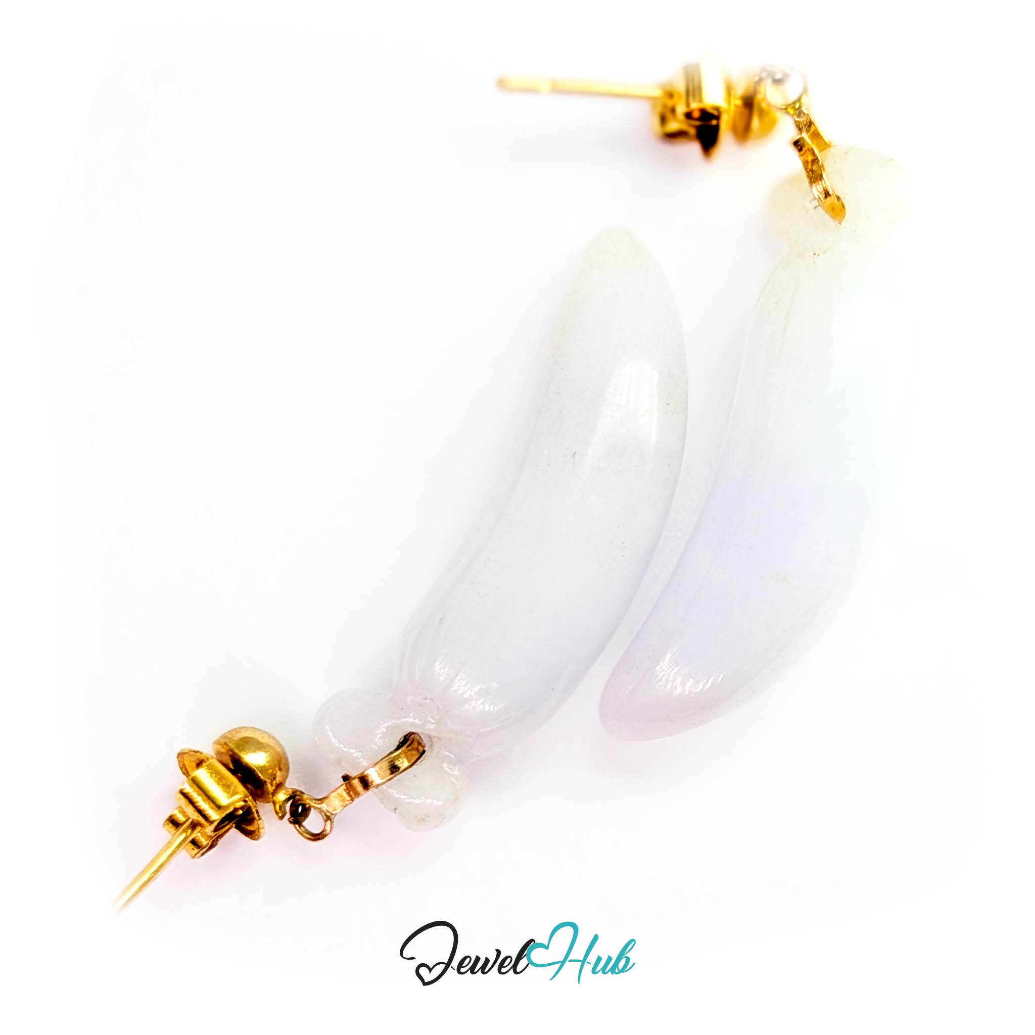 Long carved fruit form ground whole from a single piece of white jade - JewelHub