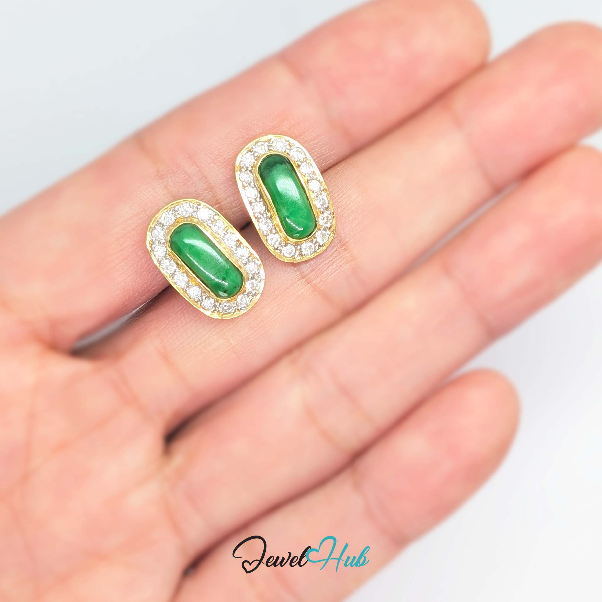 Thirty-two round diamonds, 0.56ct, paved around the jade in a soft-cornered gold plate - JewelHub