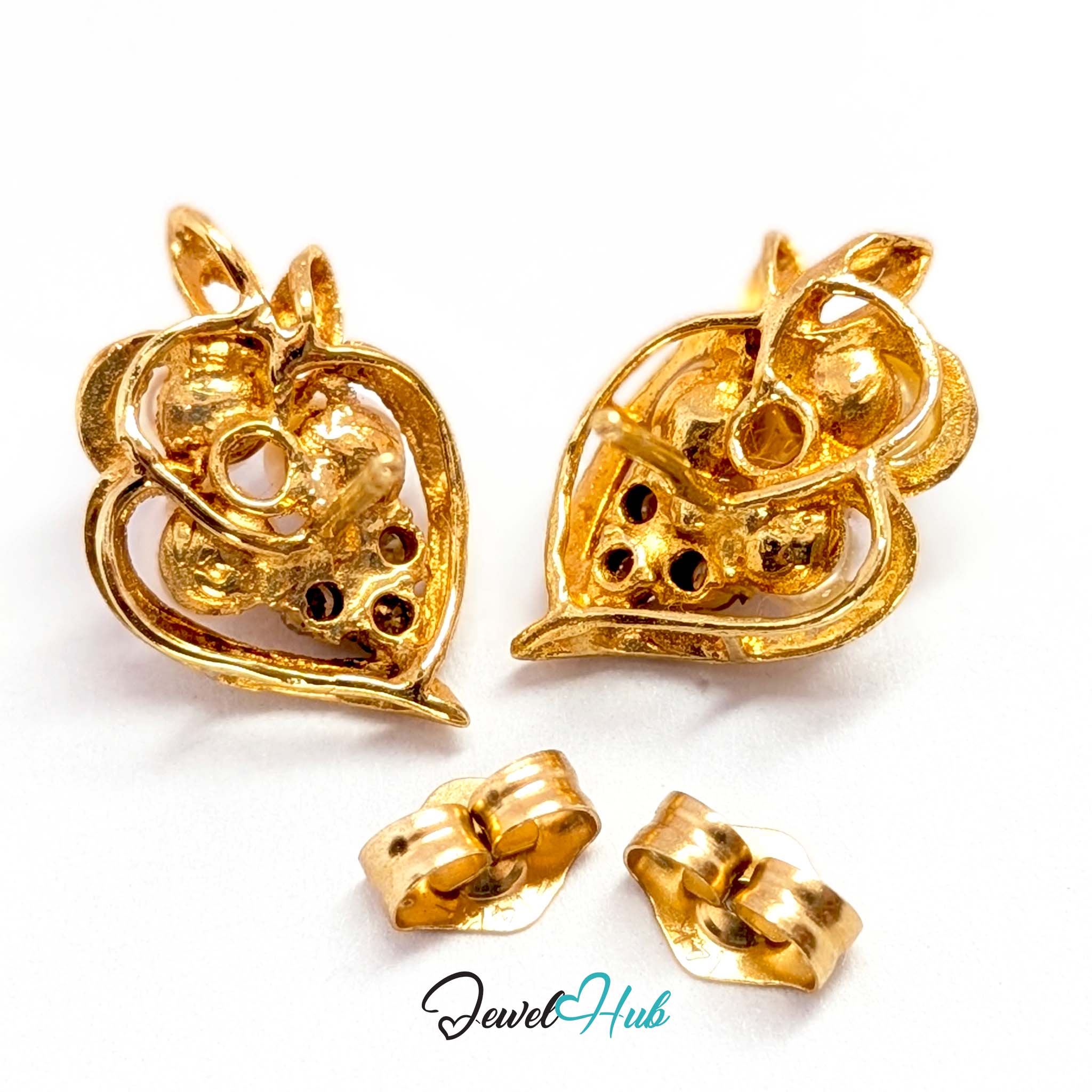 Gold curling around the pearls rather than gripping them, like seeds in a pod - JewelHub