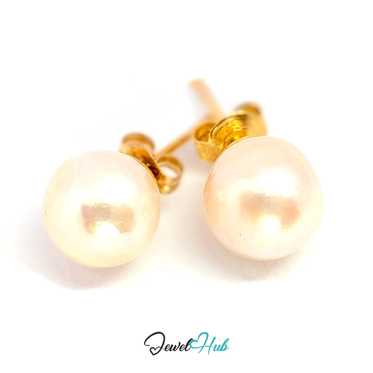 White pearl body colour with a warm pink blush running through the lustre - JewelHub