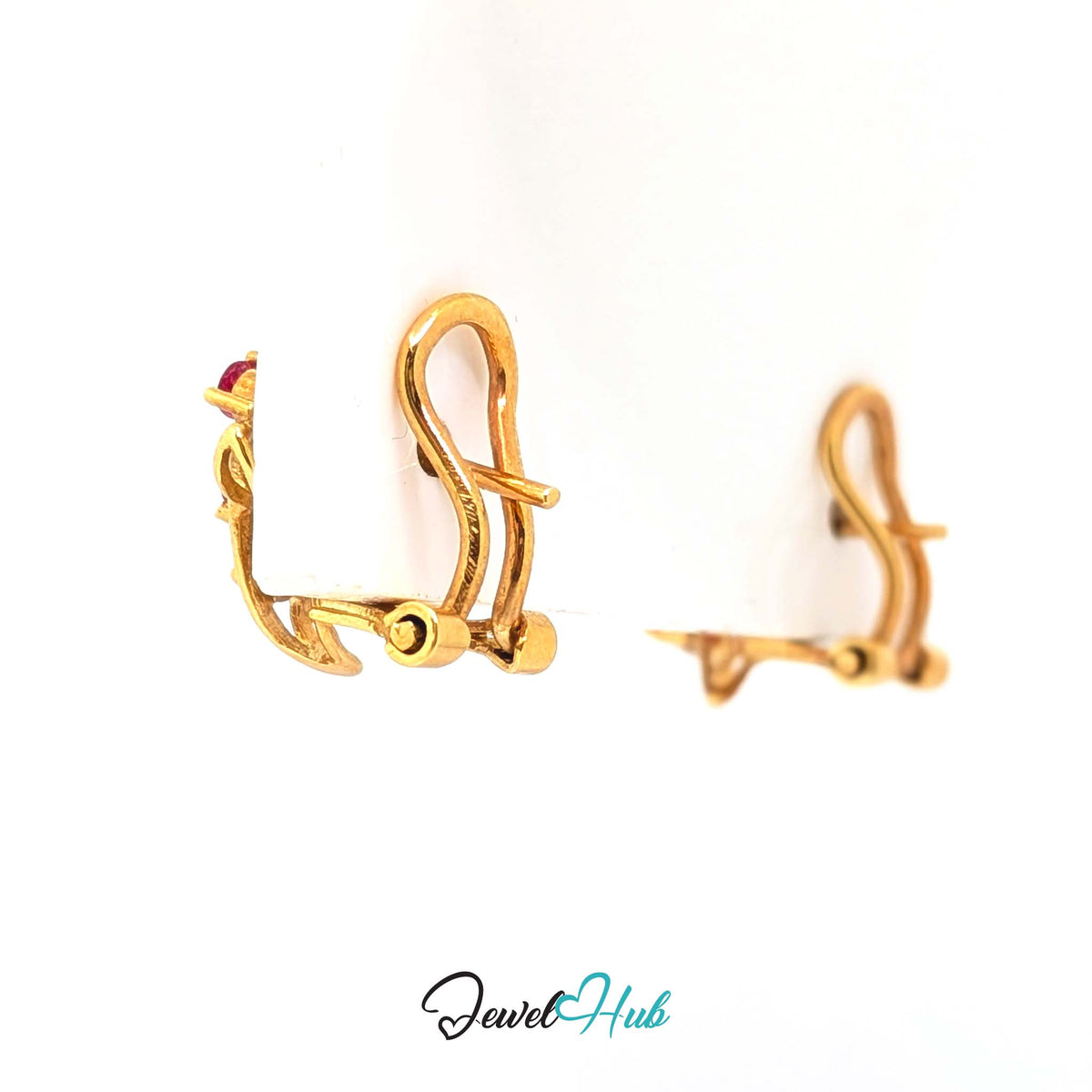 Bright clear red of the natural rubies against warm 14k yellow gold - JewelHub