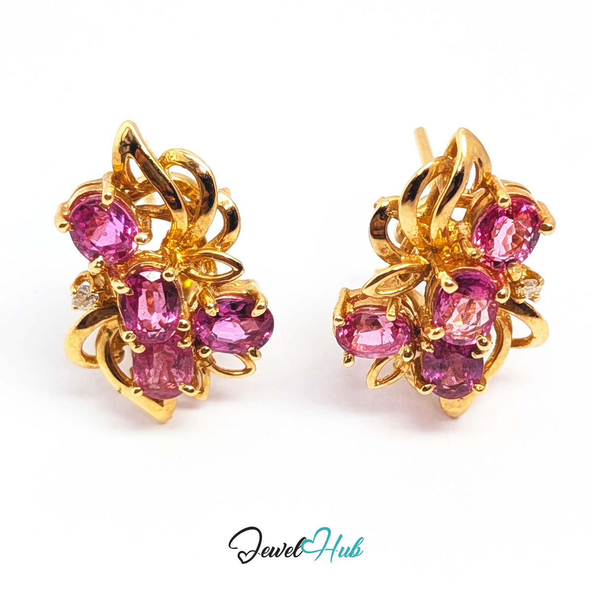 Four oval pink sapphires per earring set at overlapping angles - JewelHub